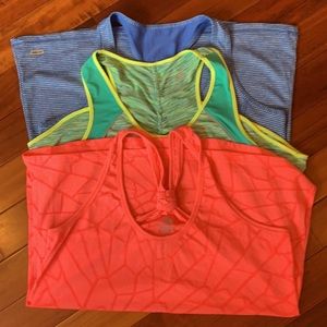 Three workout tanks